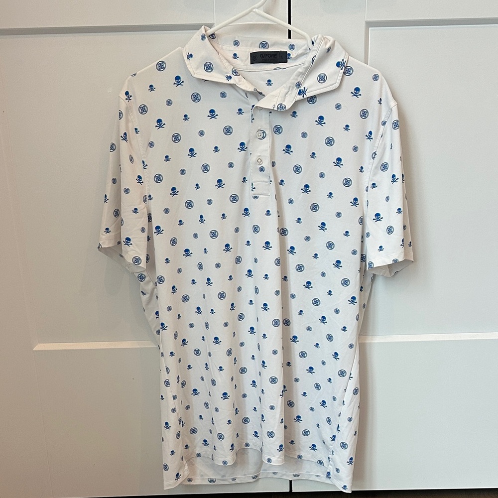 G/FORE White Polo with Blue Skull Pattern